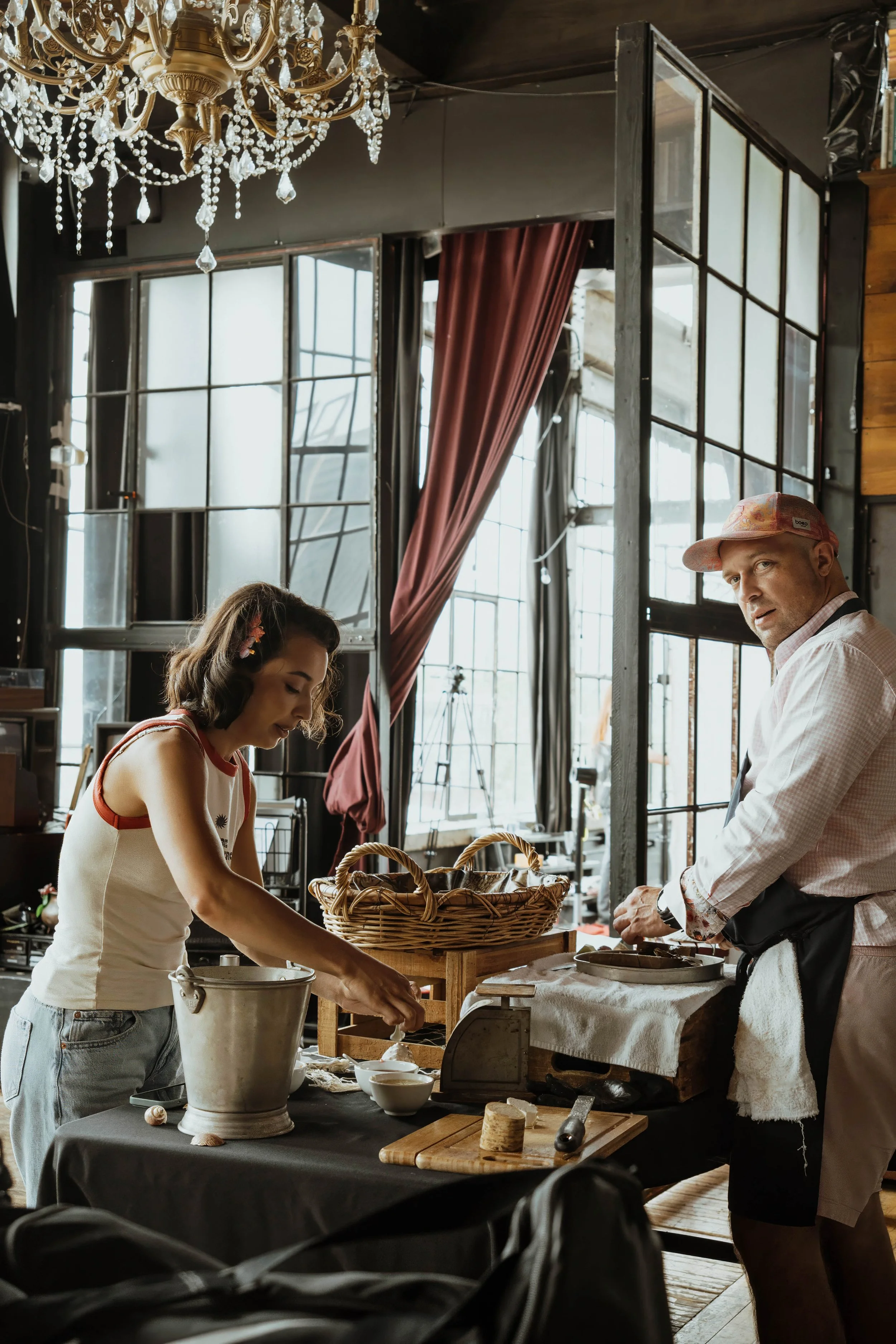 Figure skater Lia Pereira behind the scenes with the Half Shell Catering oyster bar during Lara Grace Creative Studio’s Olympic athlete editorial photoshoot at OBJX Studio in Toronto.