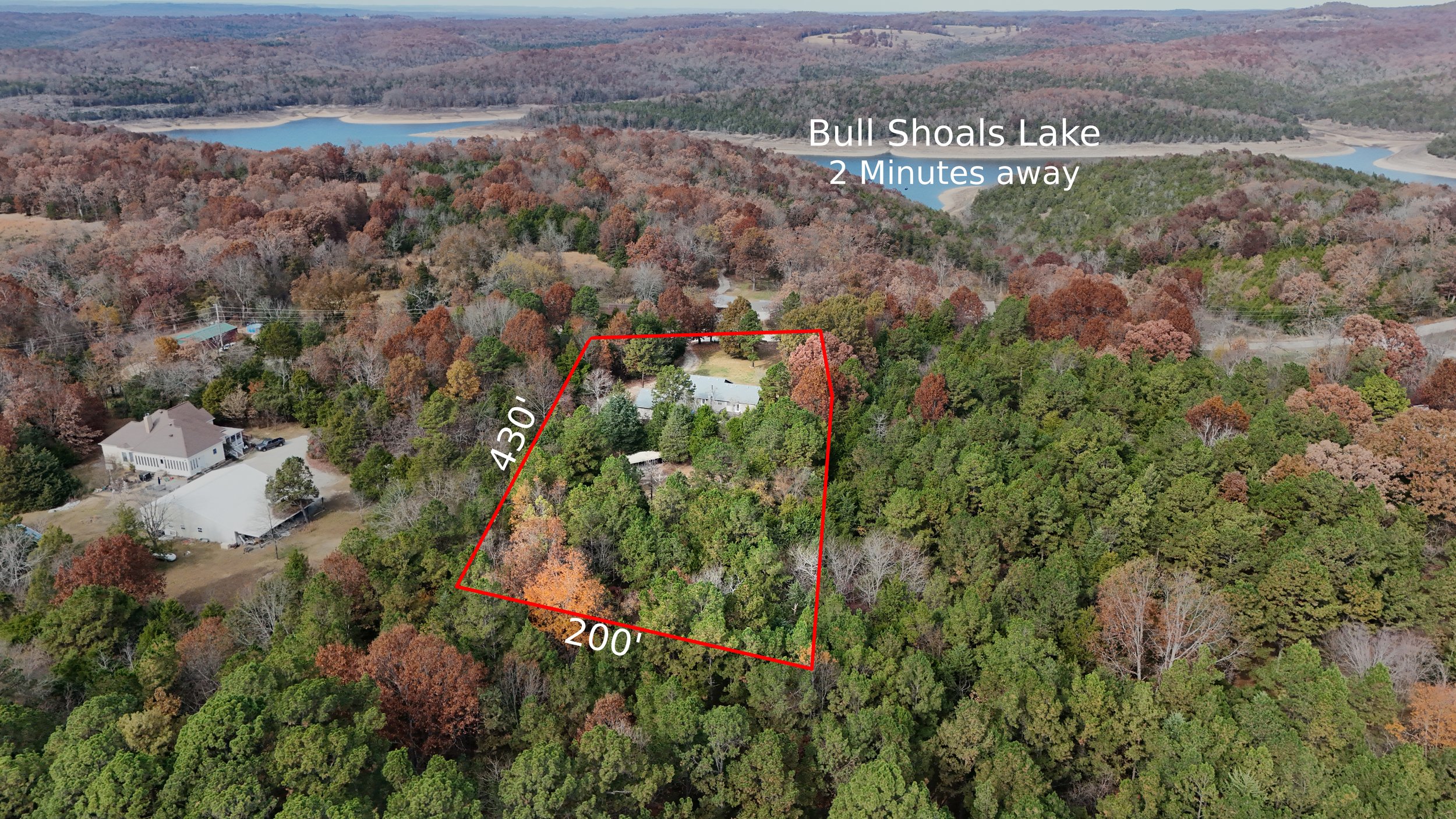 Aerial view of a house within a forest, featuring distance overlays showcasing its proximity to surrounding natural elements.