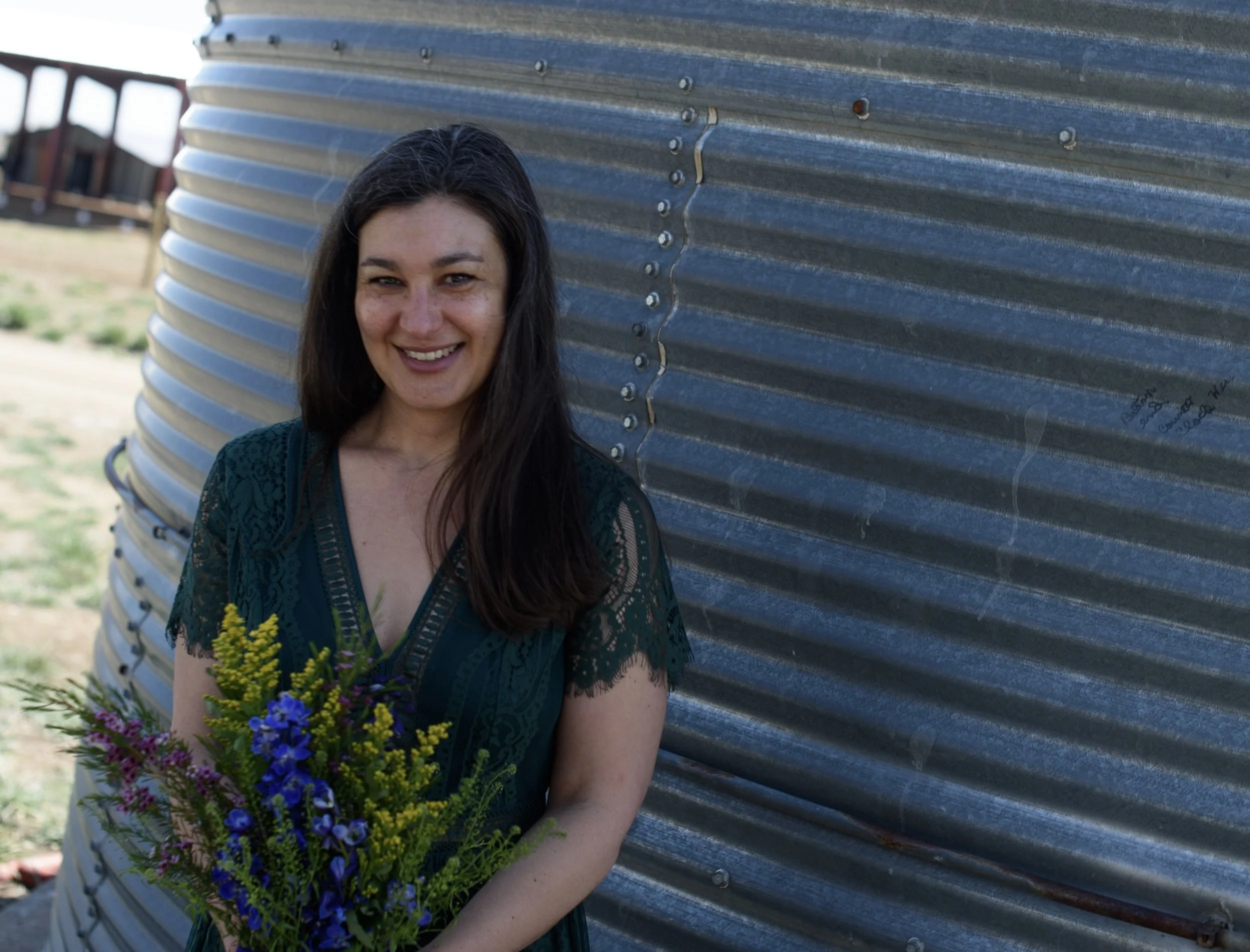 Farmer with bouquet of flowers