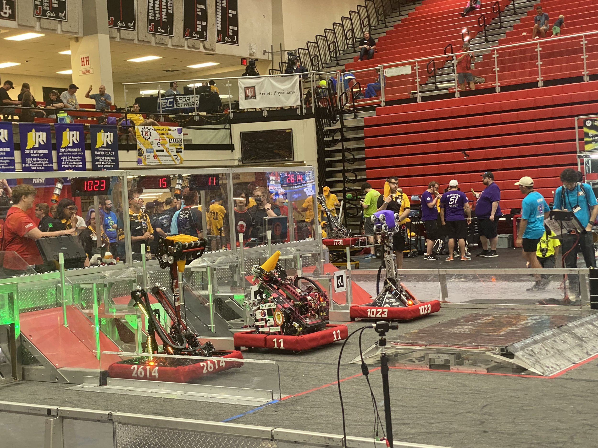  1023’s drive team and robot all set up and ready to go right before their match! 