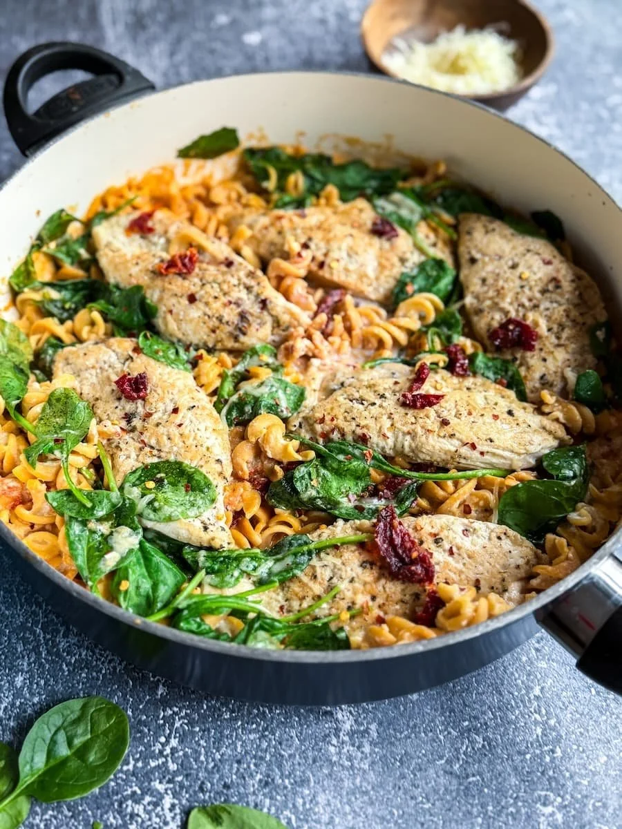 close-up view of marry me chicken pasta in a skillet