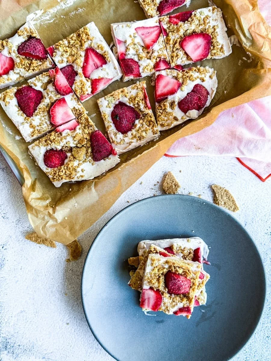 yogurt bark recipe - pan of yogurt bark plus slices on a plate