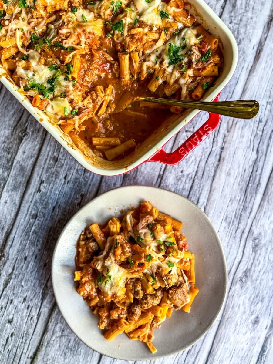 overhead shot of protein pasta with a portion on a plate next to the dish