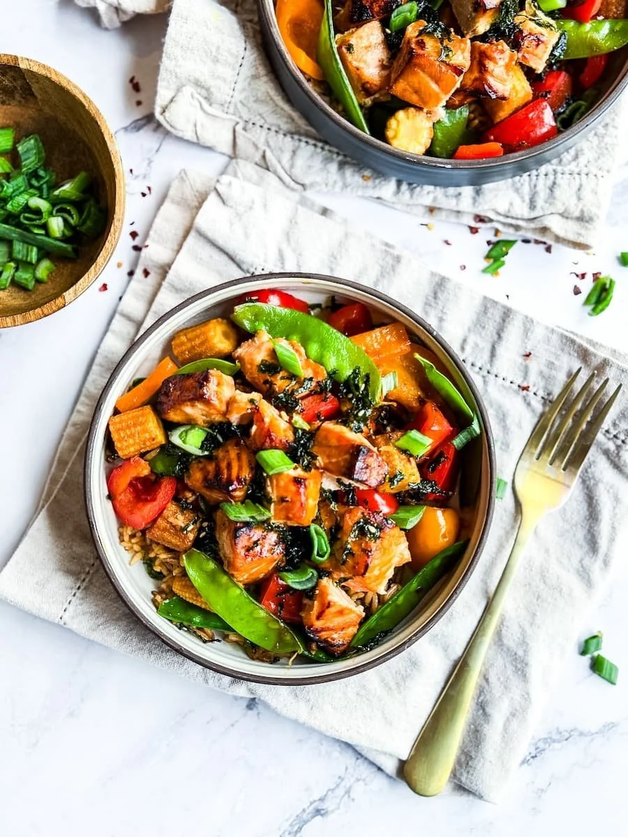 salmon air fryer recipe - finished portion of honey garlic salmon with vegetables