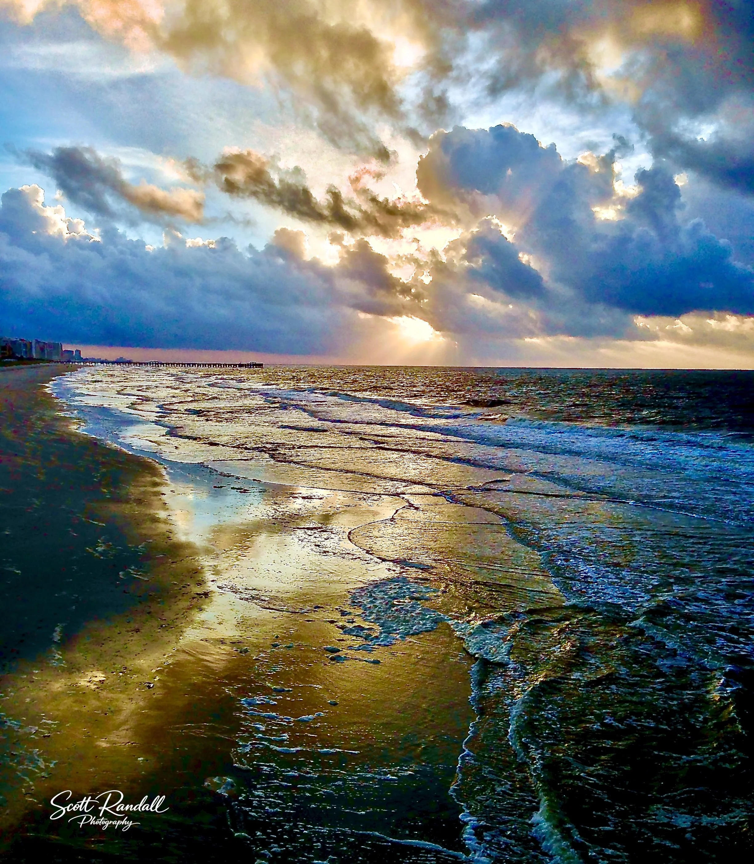 "Coastal Day Break". Love the way the water dances on the beach as the sun rises.  Myrtle Beach, SC.
