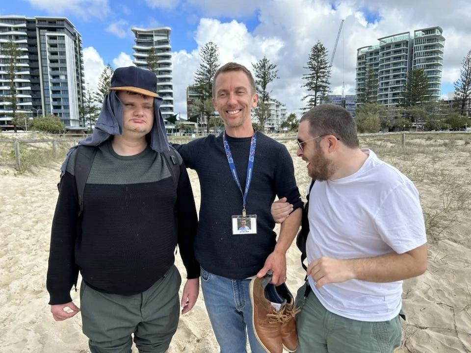 Peter and clients on beach