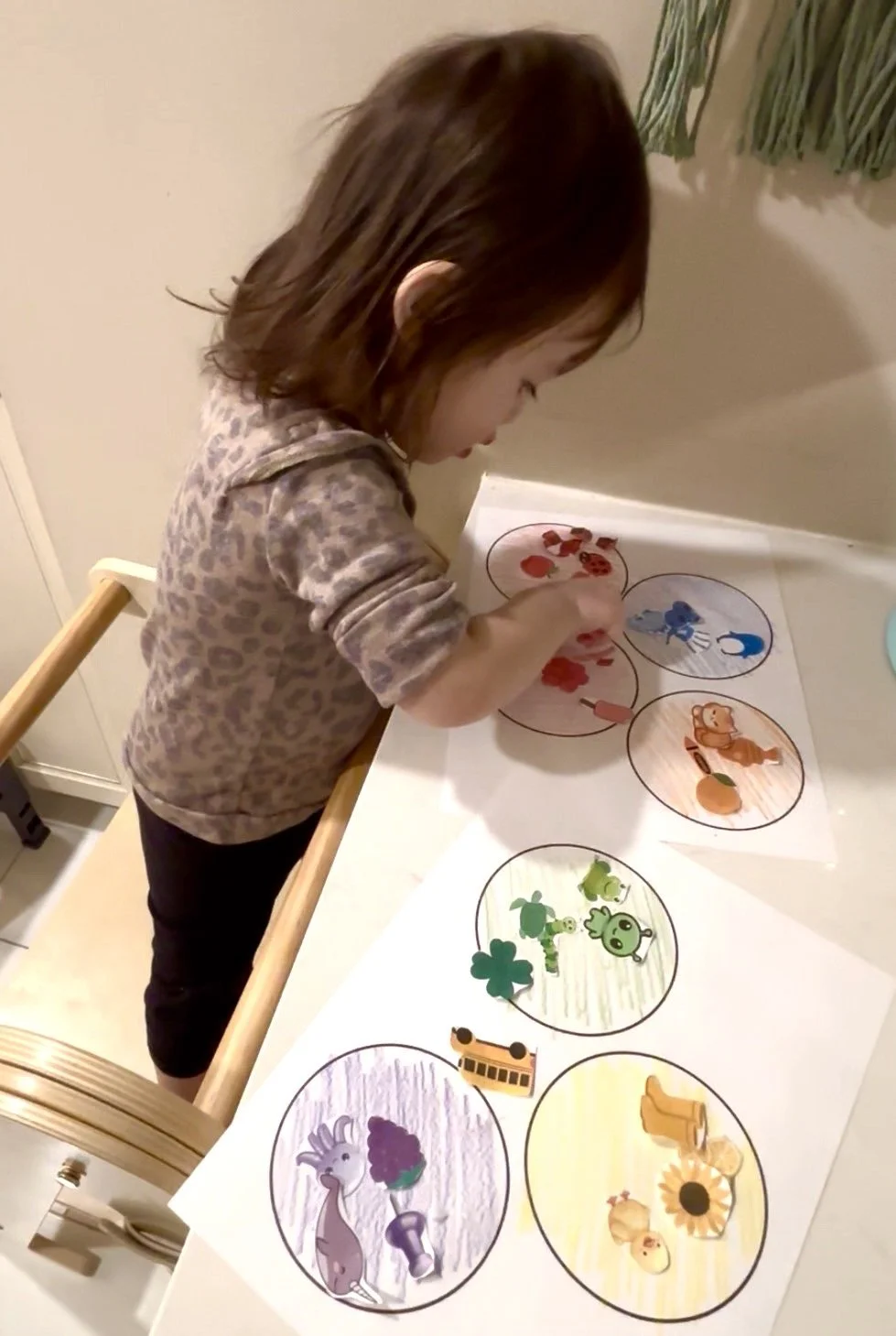 This is a photo of a toddler doing a color matching activity