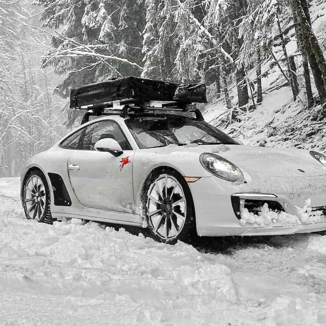 1080+Wht-911-snowy-road-front-angled.jpg