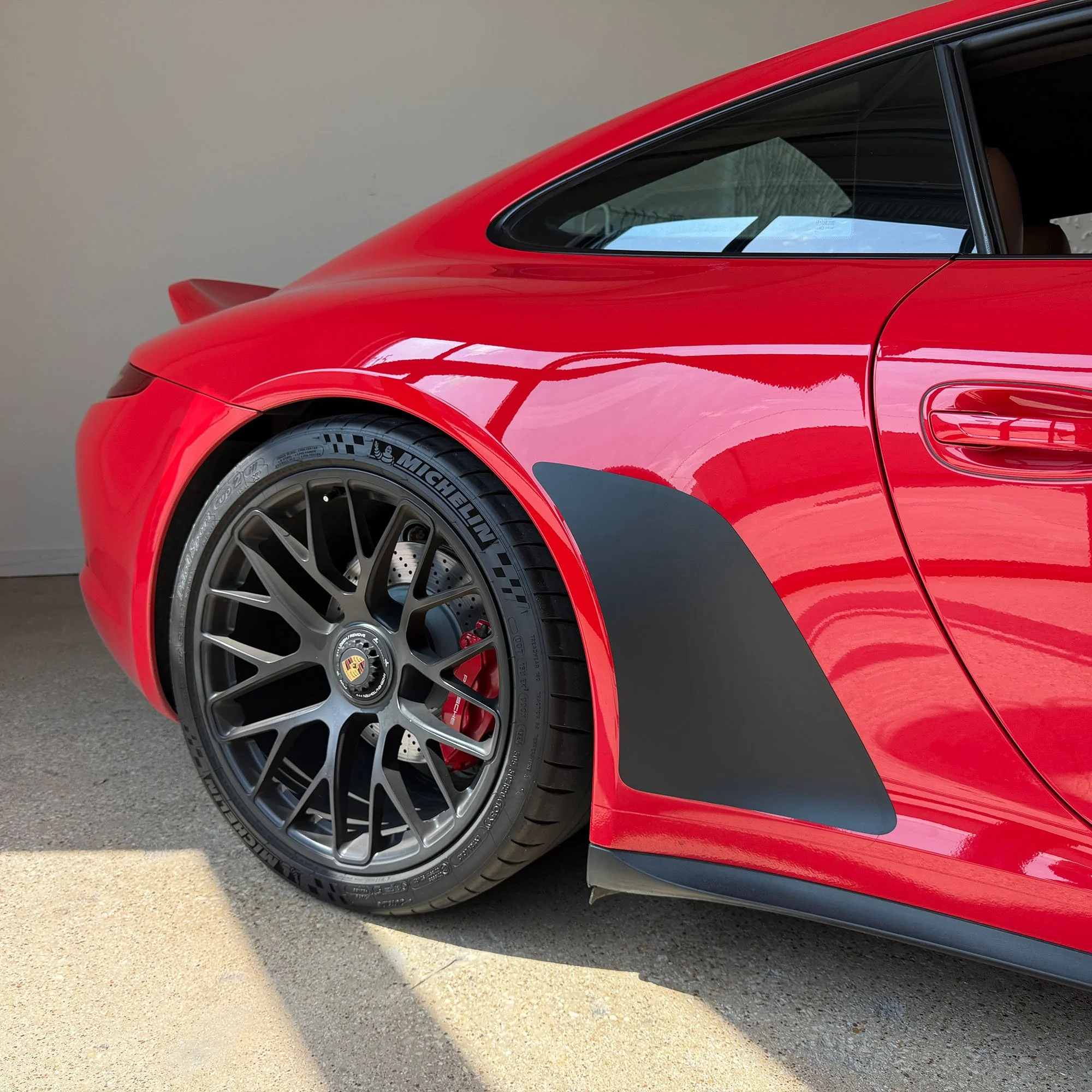Porsche-911-991.1-GTS-rear-view-with-MagnaFIn chip-guards.psd.jpg