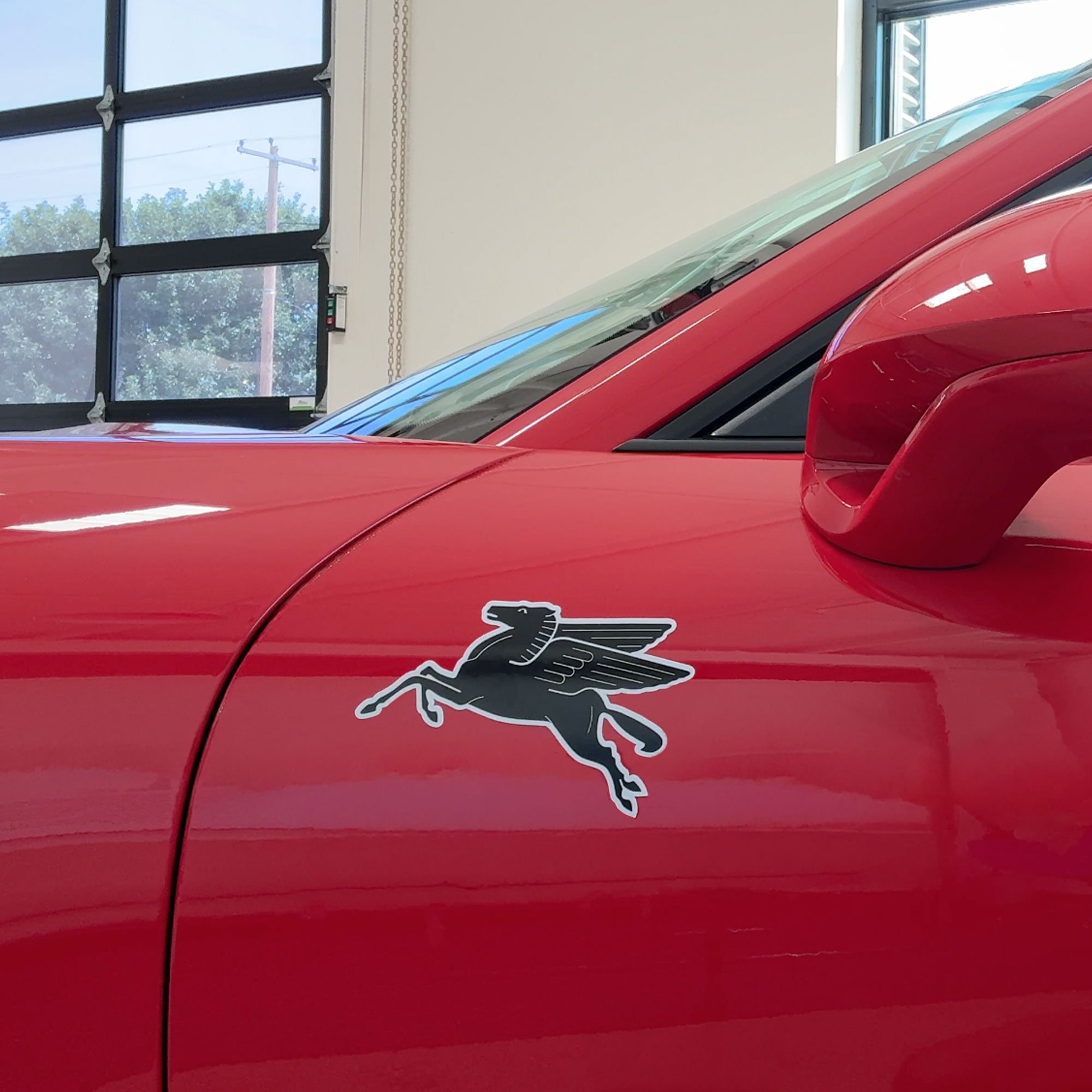 black-racing-Pegasus-on-red-porsche-991.1-GTS-side-view1x1.jpg
