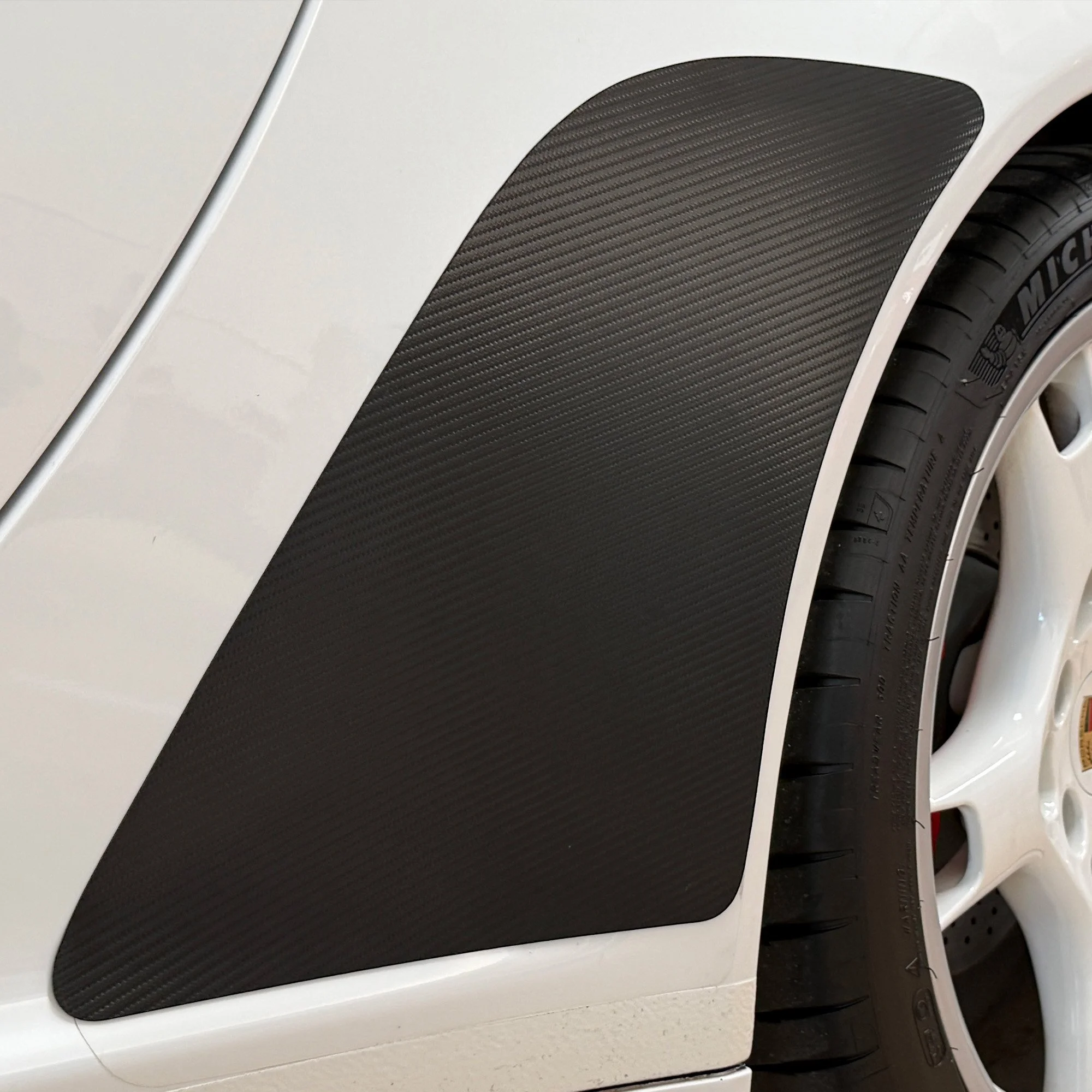 1x1 Close up_White-997-with-Carbon-Fiber-MagnaFin stoneguards copy.jpg