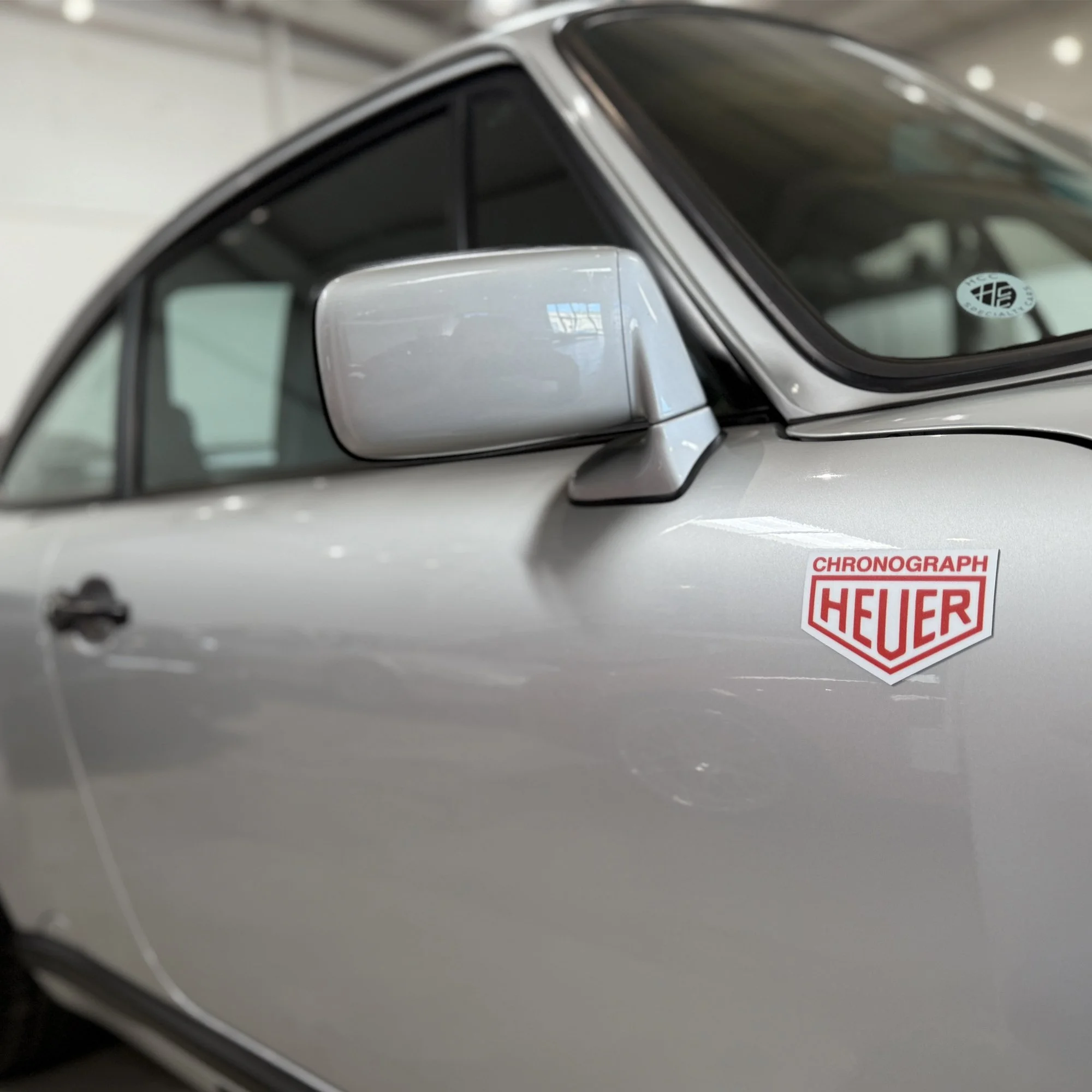 Red-Heuer-magnet-911-frt-angled view.jpg