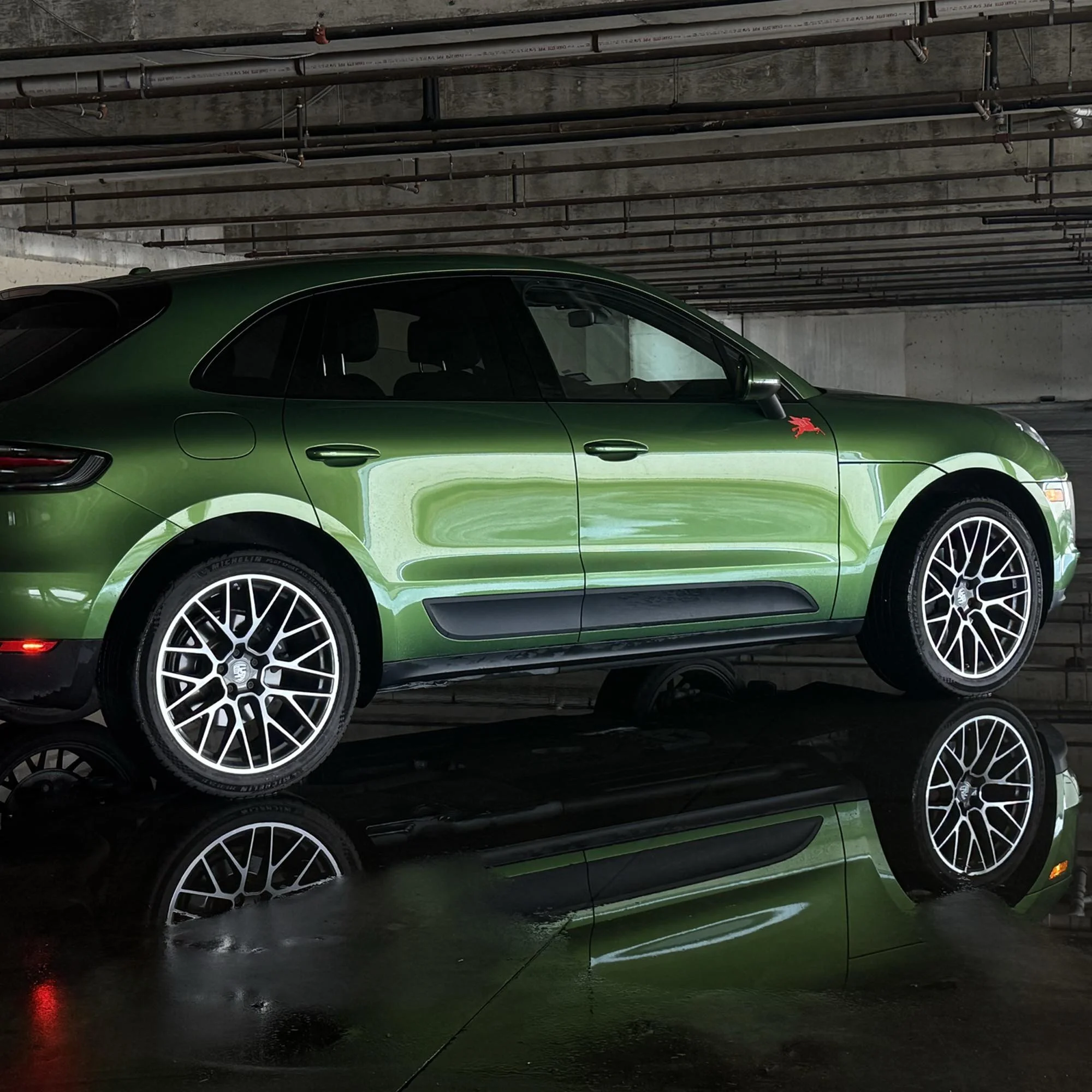 Macan-with-Red-pegasuss-magnet-rear-angled-view-wide.jpg