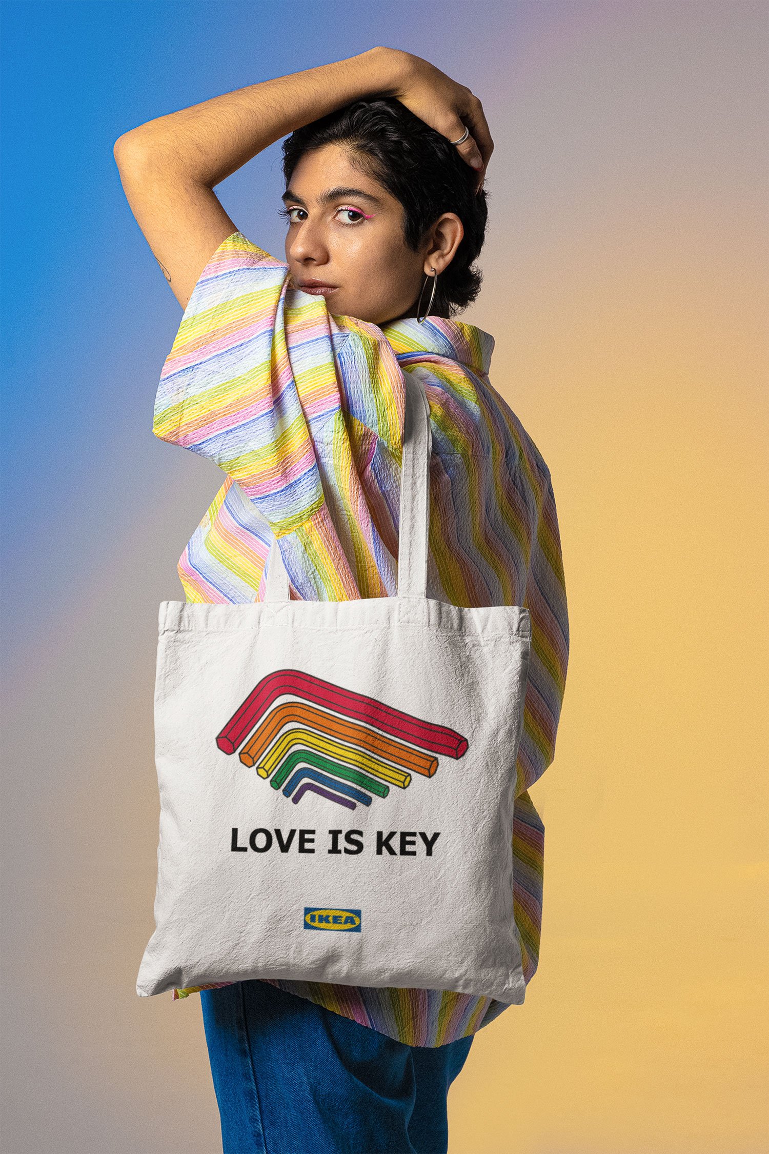 mockup-of-a-tote-bag-featuring-a-woman-with-a-rainbow-shirt-m24032.jpg
