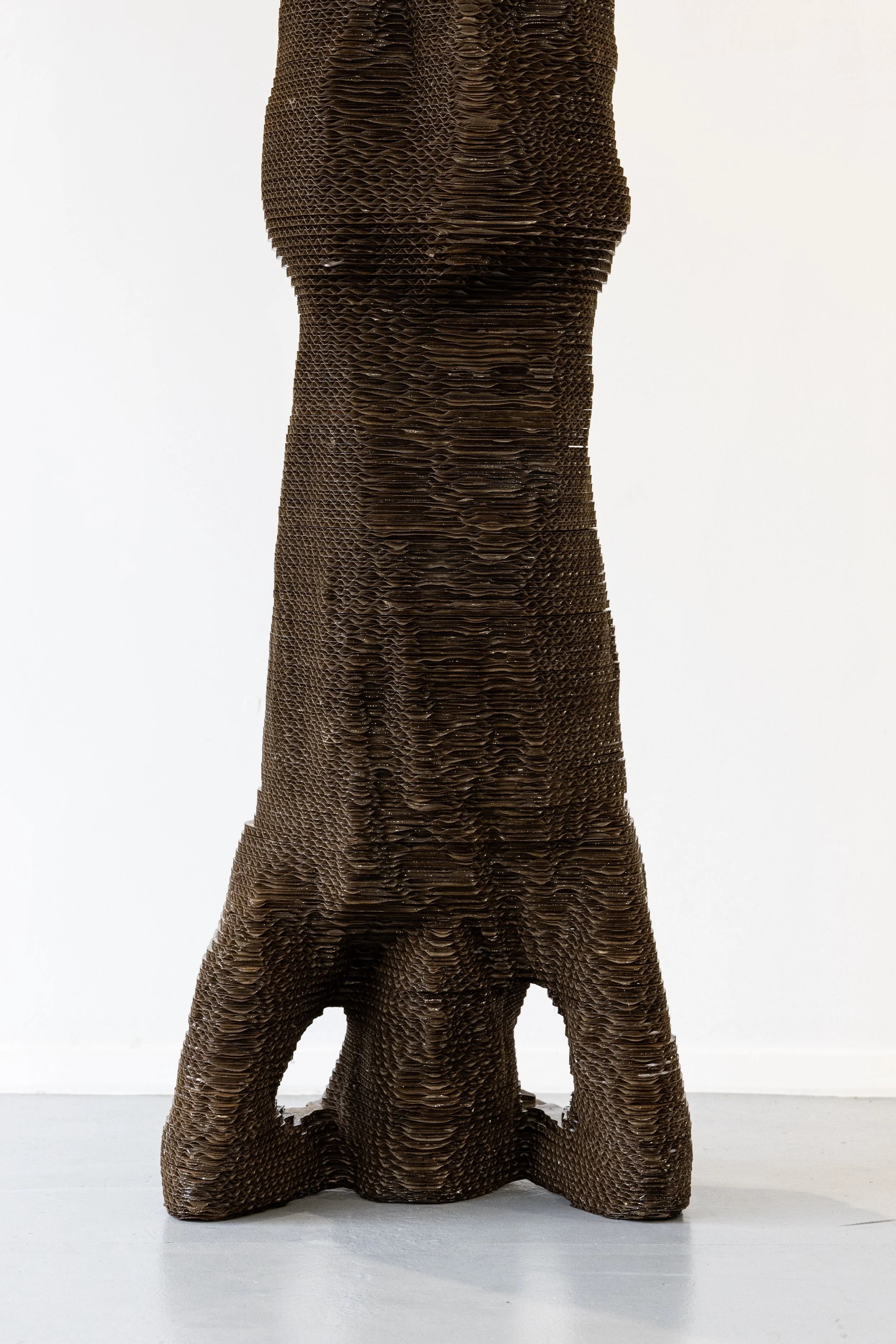 'Headstand' (2023, Cardboard & resin, 163(H)x38(W)x37(D)cm.