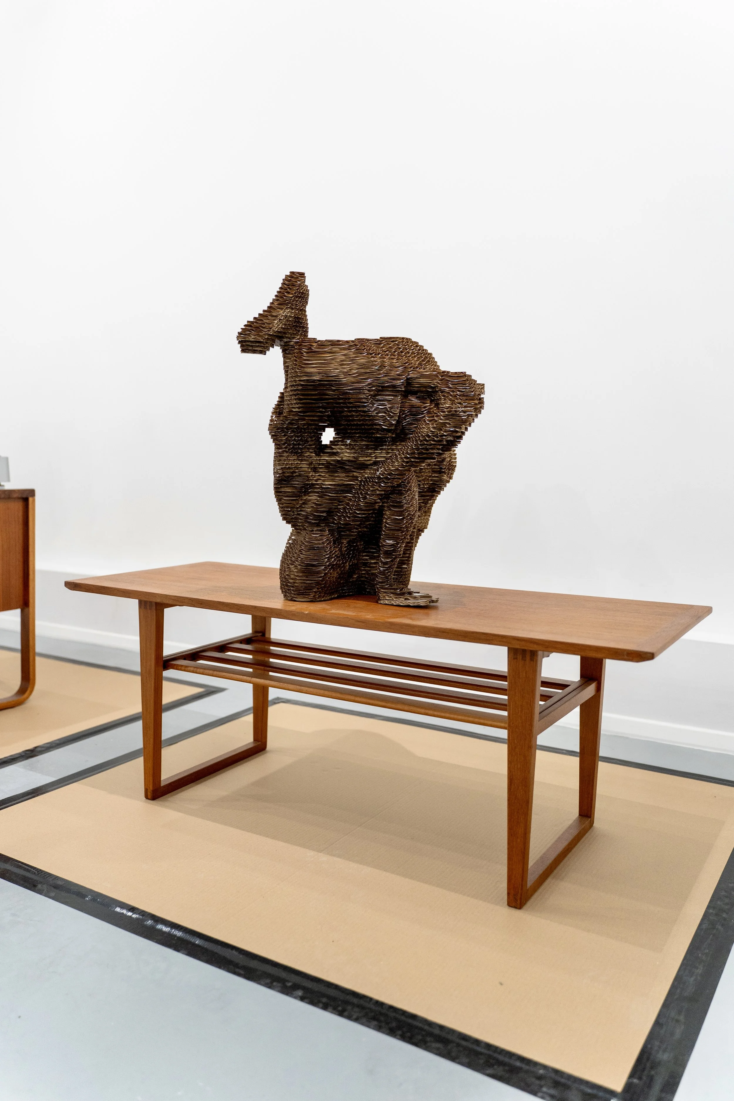 'Leg Lock' (2023), Cardboard, 43(H)x33(W)x32(D)cm.