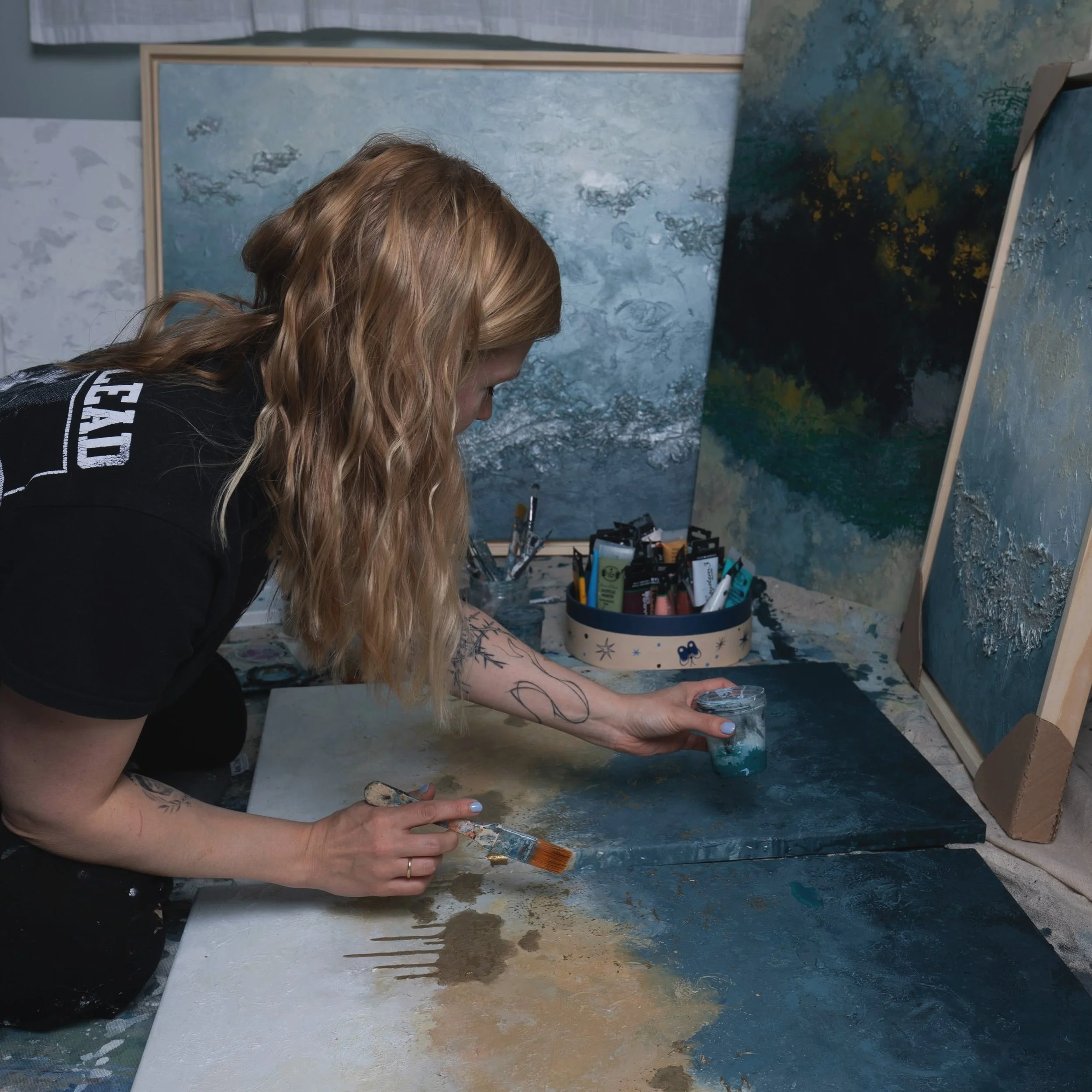 Here is a rare glimpse into my tiny makeshift studio - pure chaos and if I turn around too quickly I always step on something or spill paint (most of my socks are ruined at this stage) but I love it and I'm grateful for it everyday. 
Oh and here is t