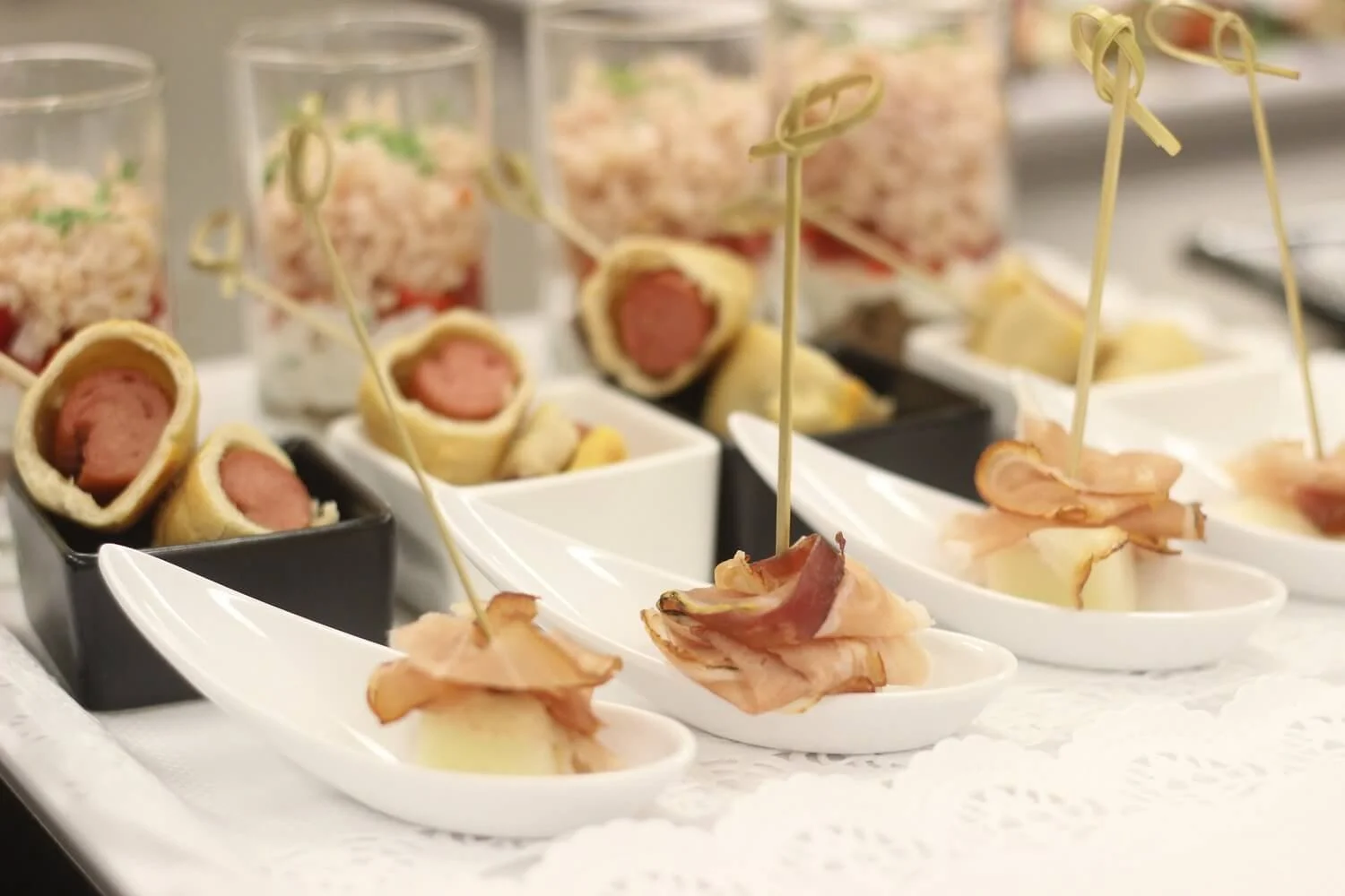 Variety of Skovriderkroen Appetizers on Display - Assortment of bite-sized appetizers elegantly presented on a platter.