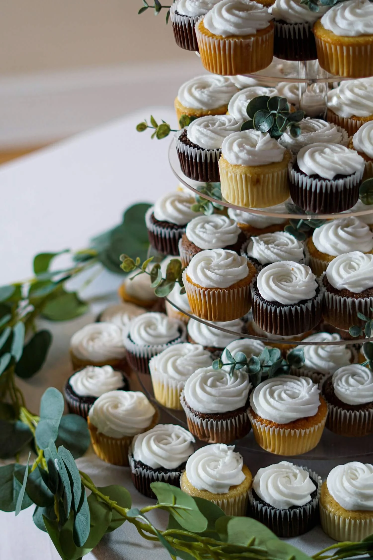 Cupcake Tower for Celebrations - A tower of frosted cupcakes, ideal for parties or receptions.