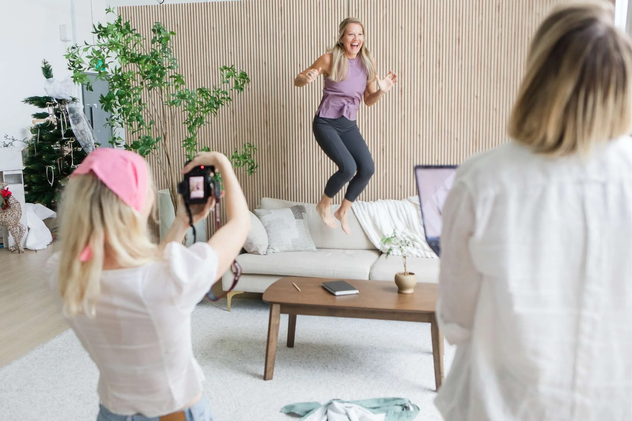 Business owner laughing during a relaxed personal branding photography session in Singapore by Nina Mucalov