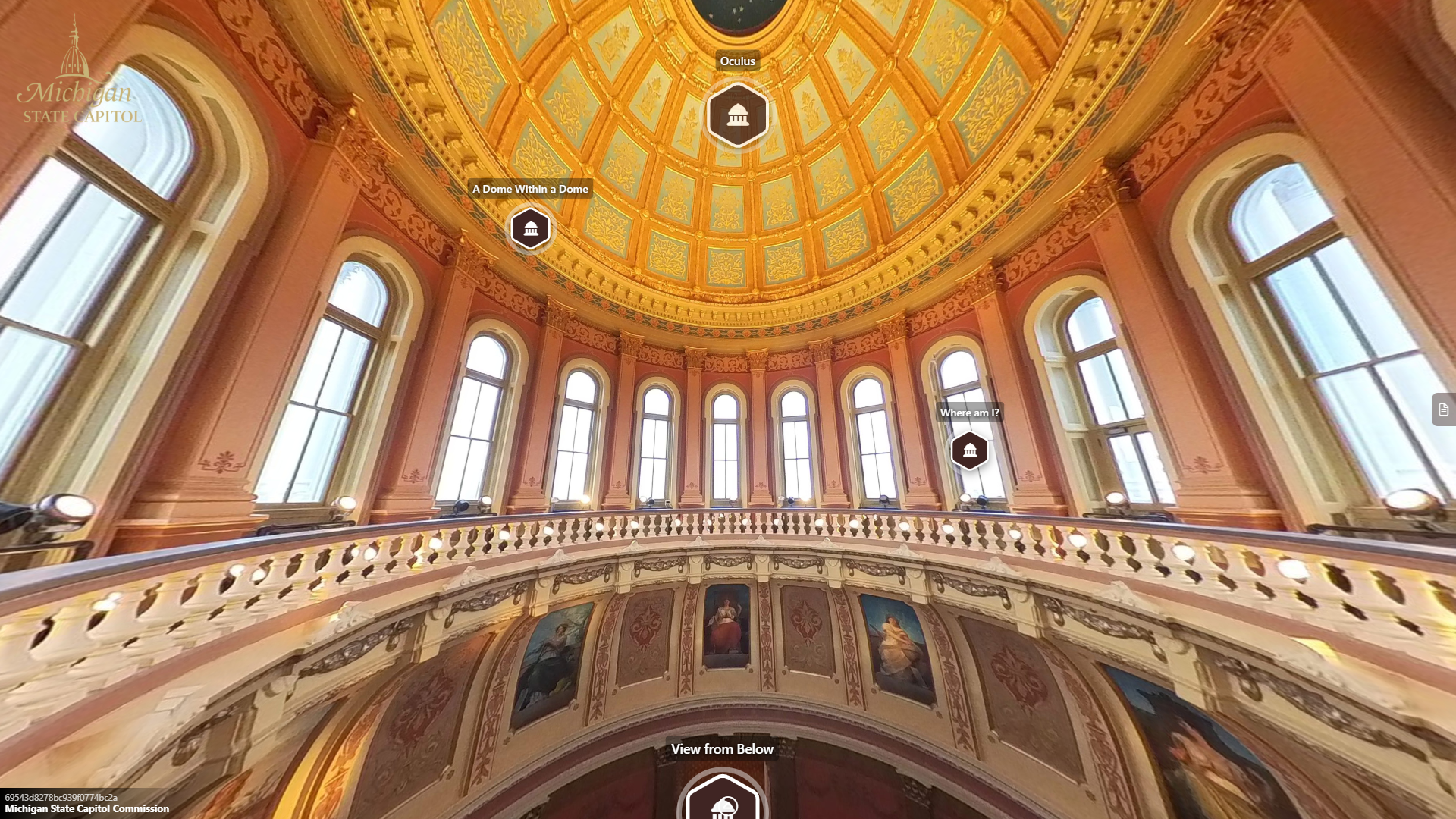 Interior view looking up into the Michigan State Capitol dome, showing ornate painted panels and central skylight