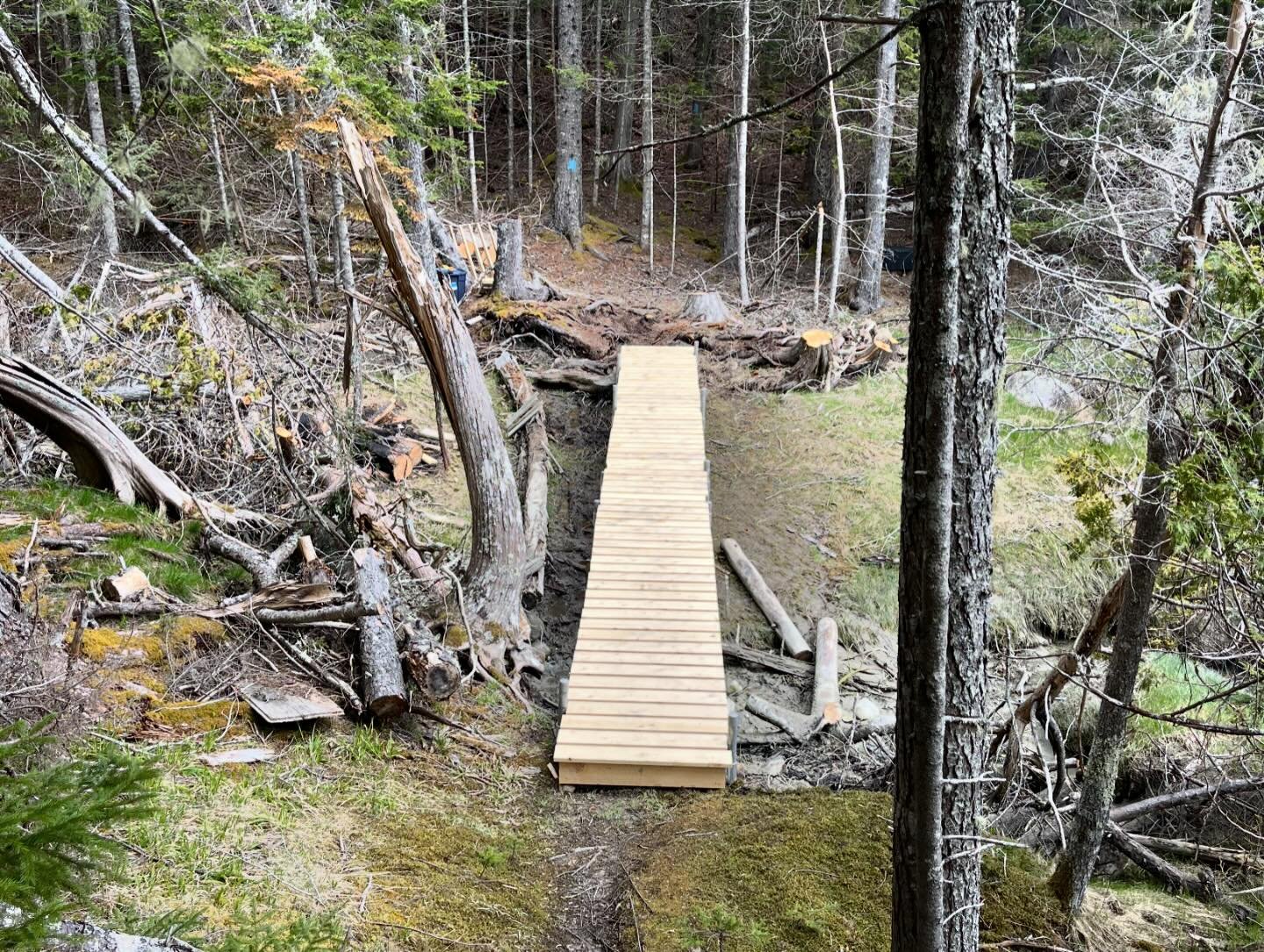 1/3 bridges replaced at the Herbert Preserve. This one was tricky, sometimes we have a hard time driving the posts into Islesboro&rsquo;s often-rocky soil to build our bridges and boardwalks, but not here. Some of these posts are 10&rsquo; long, with