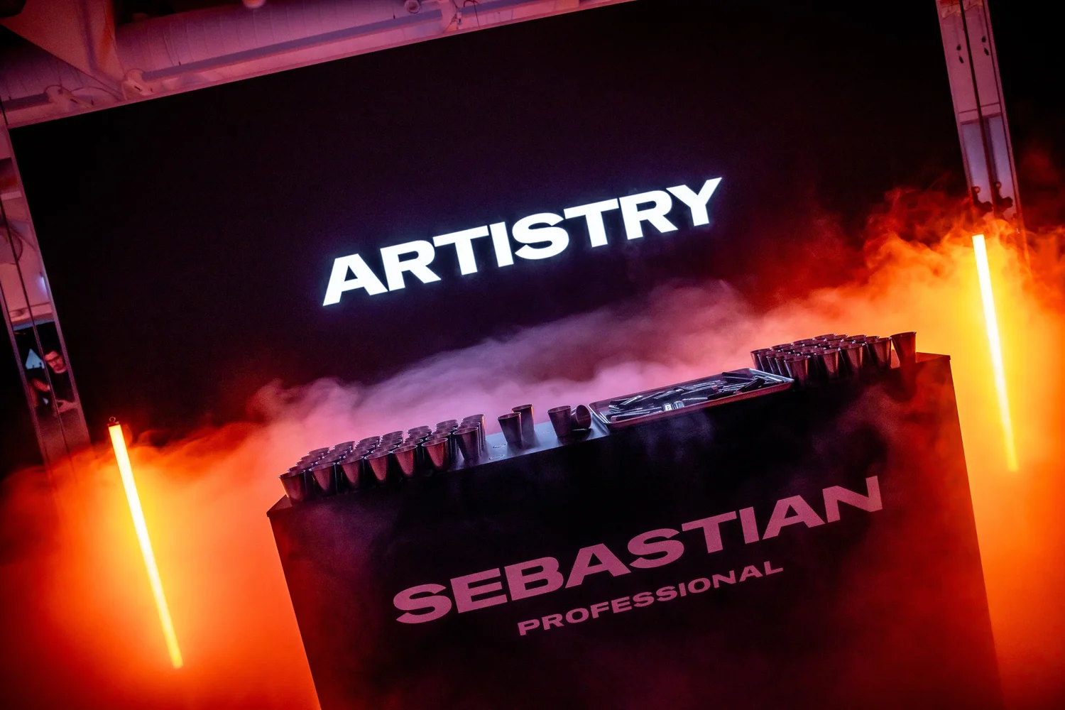 ARTISTRY screen above a Sebastian Professional plinth in haze