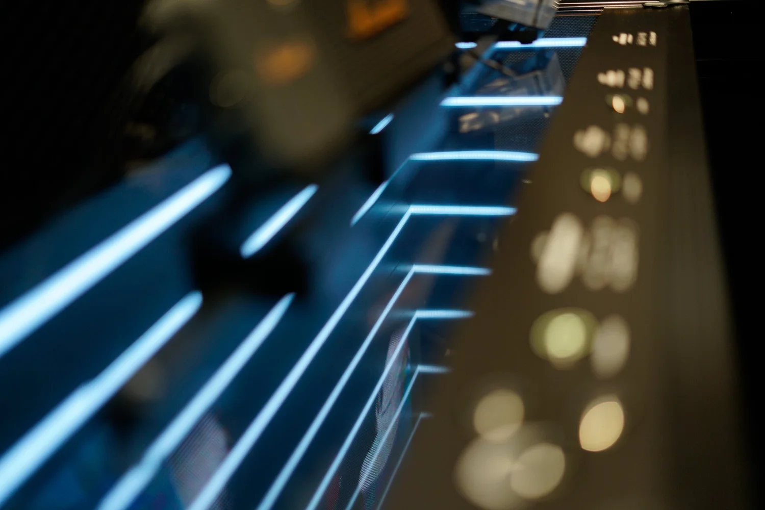 Close-up of Marshall amplifier-style display details in blue light