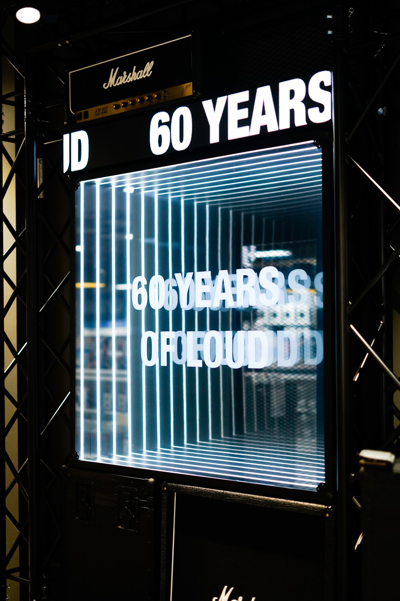 Illuminated “60 Years of Loud” wall display