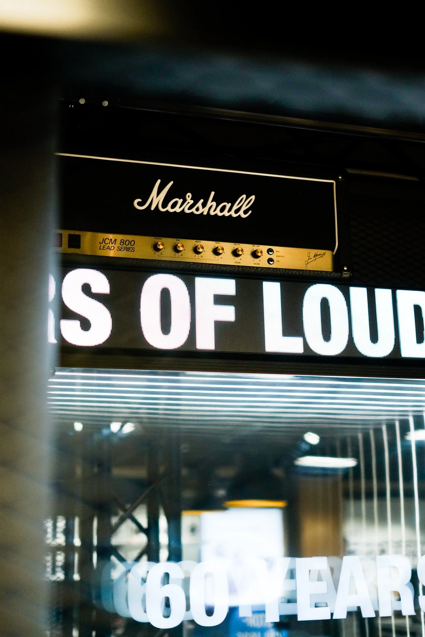 Marshall sign above a “60 Years of Loud” light display