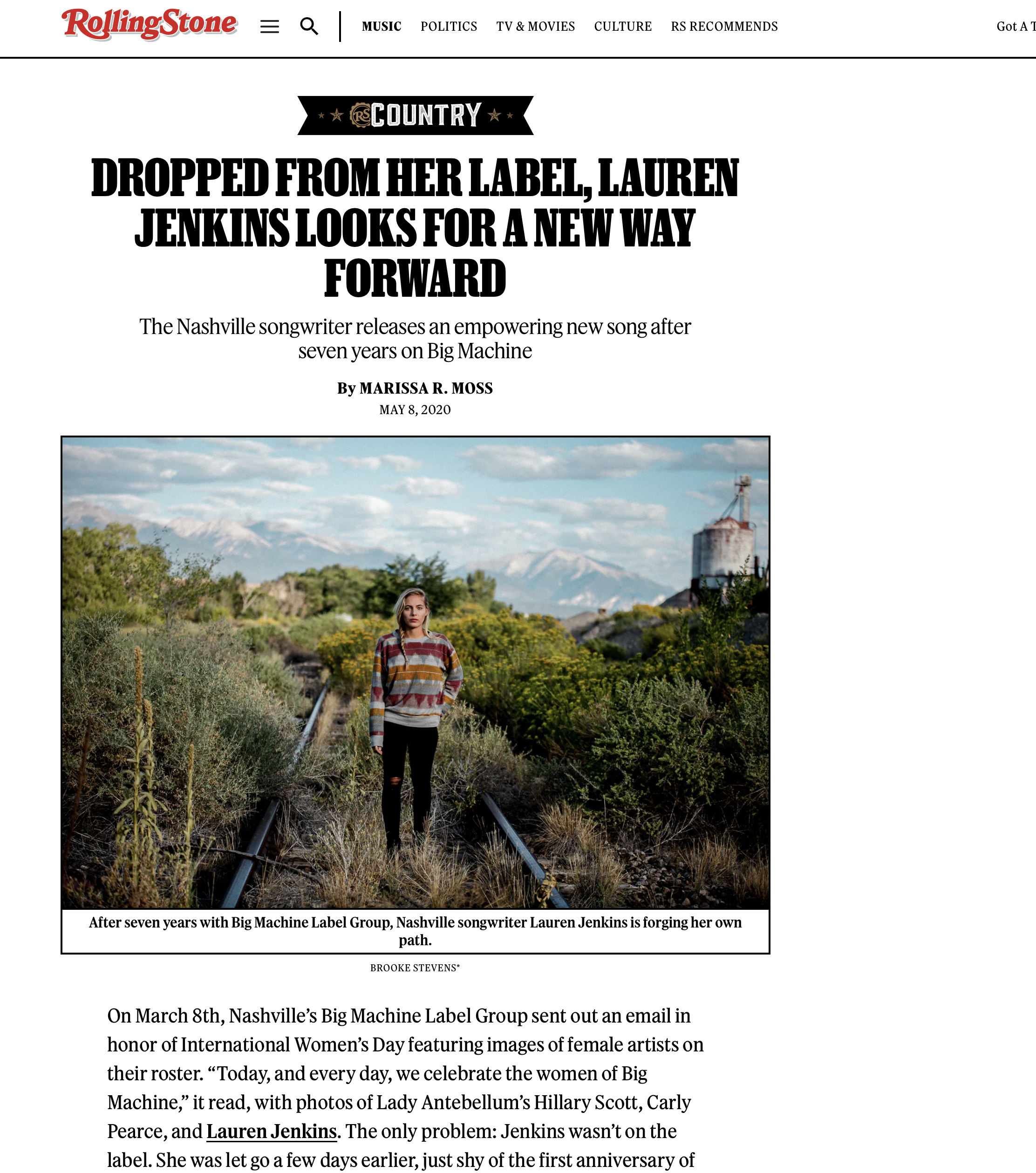 Rolling Stone article webpage featuring a woman standing in a field with a mountain and sky background, title about Lauren Jenkins leaving her label, and a photo of Lauren Jenkins.