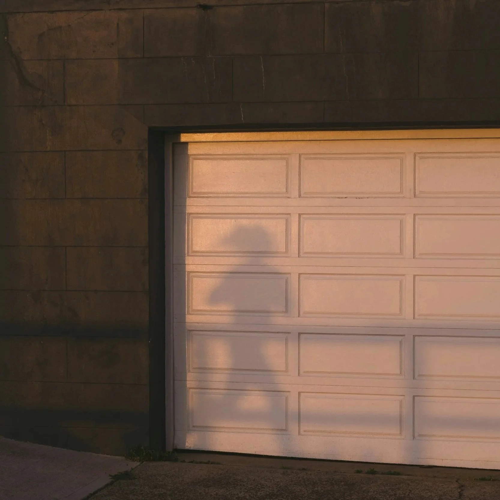 How a Well-Insulated Garage Door Saves Money and Keeps the Garage from Feeling Like an Oven