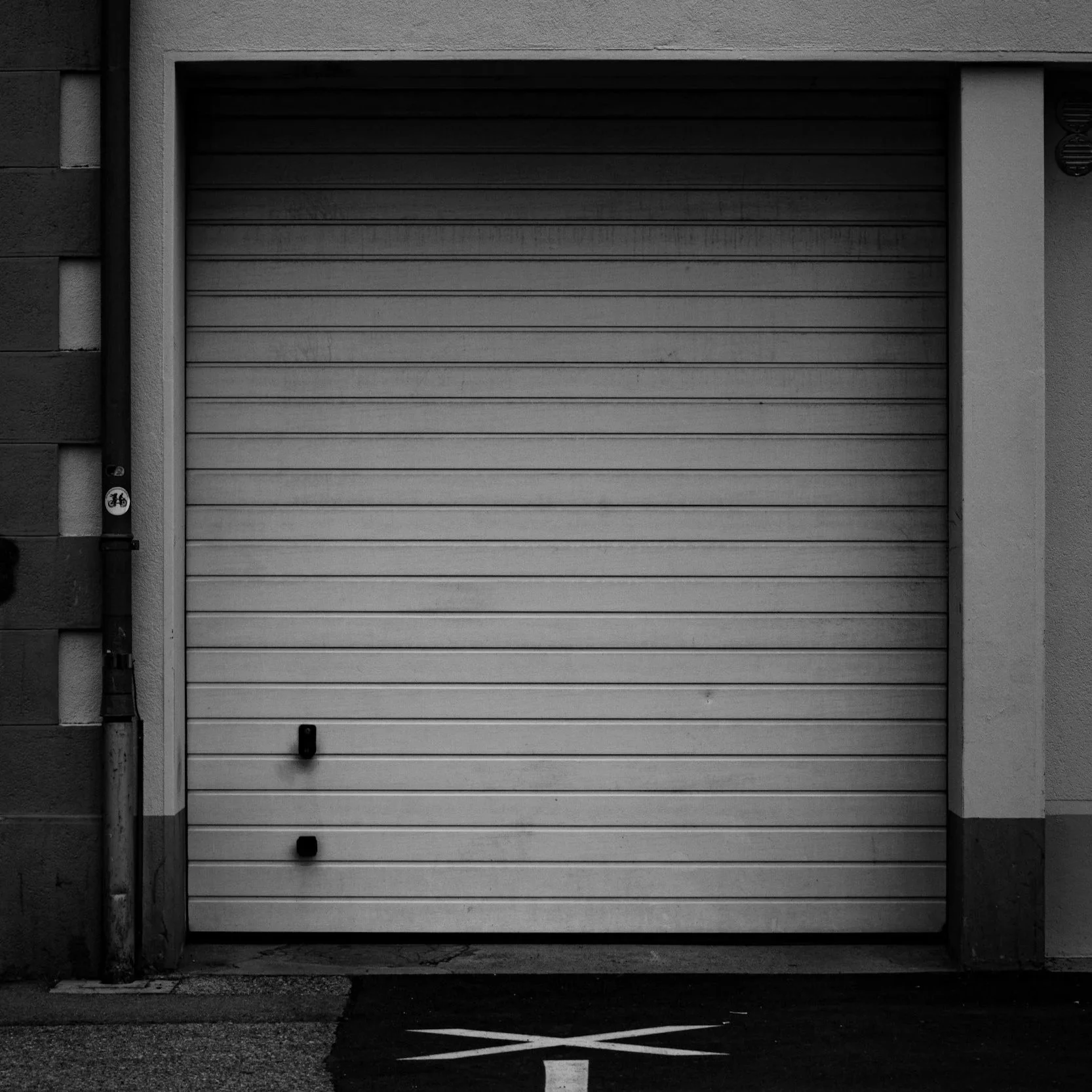 Avoiding High Garage Door Repair Costs