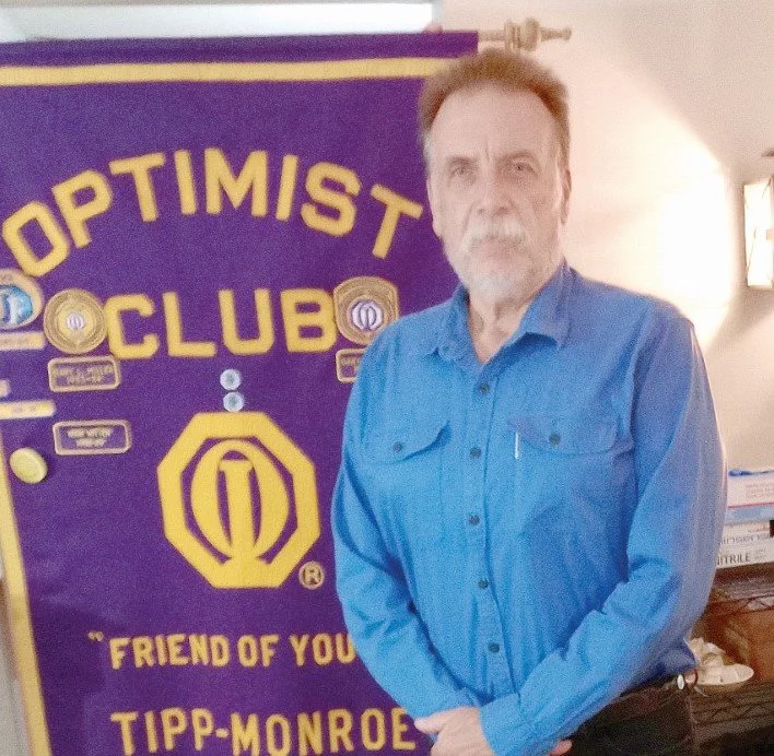 Dr. Martin English visits with the Optimists