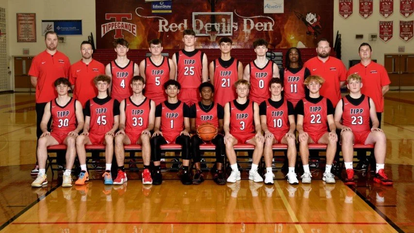 Red Devils earn win against improved Green Wave squad