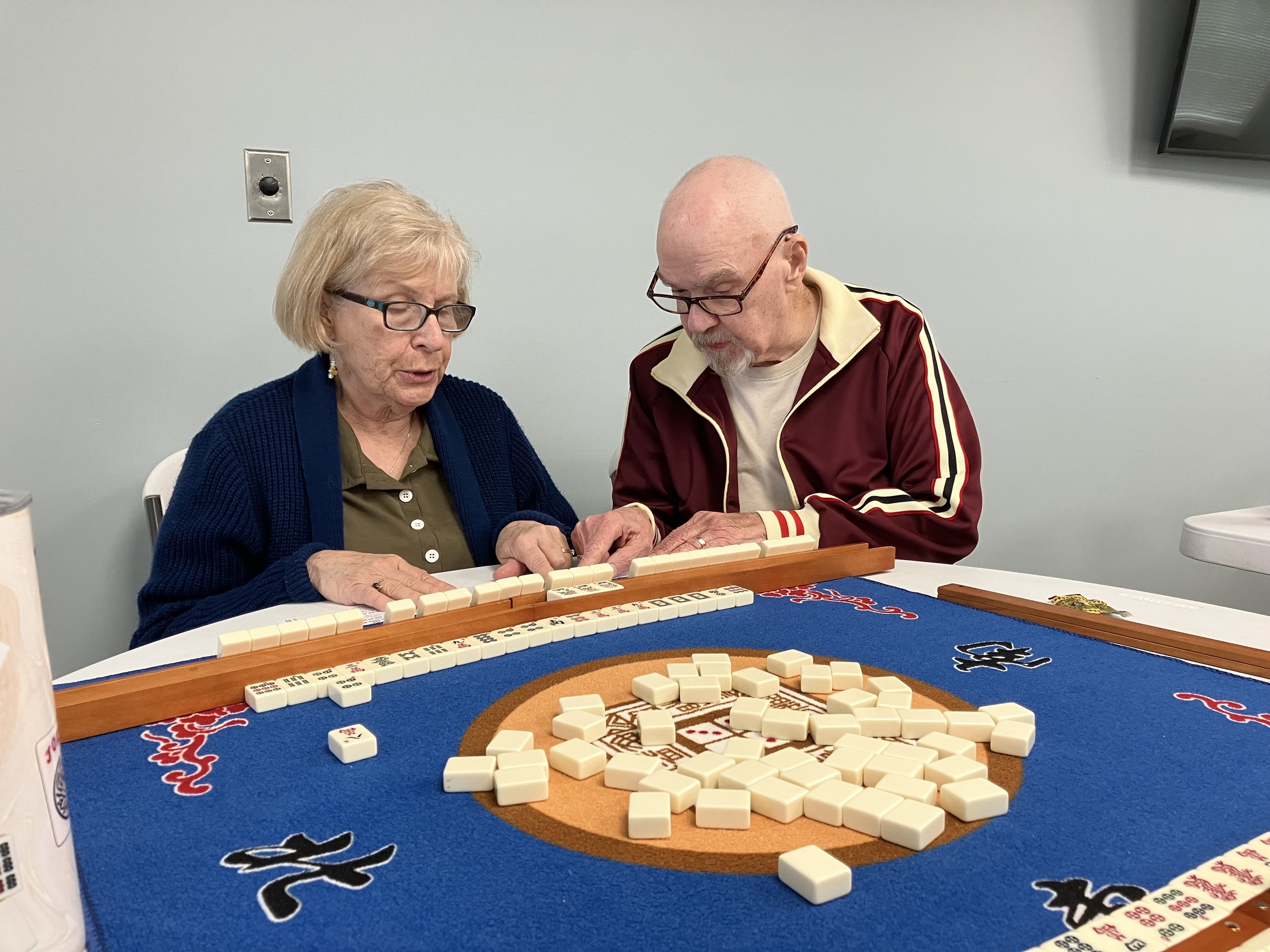 Seniors play Mahjong with a twist