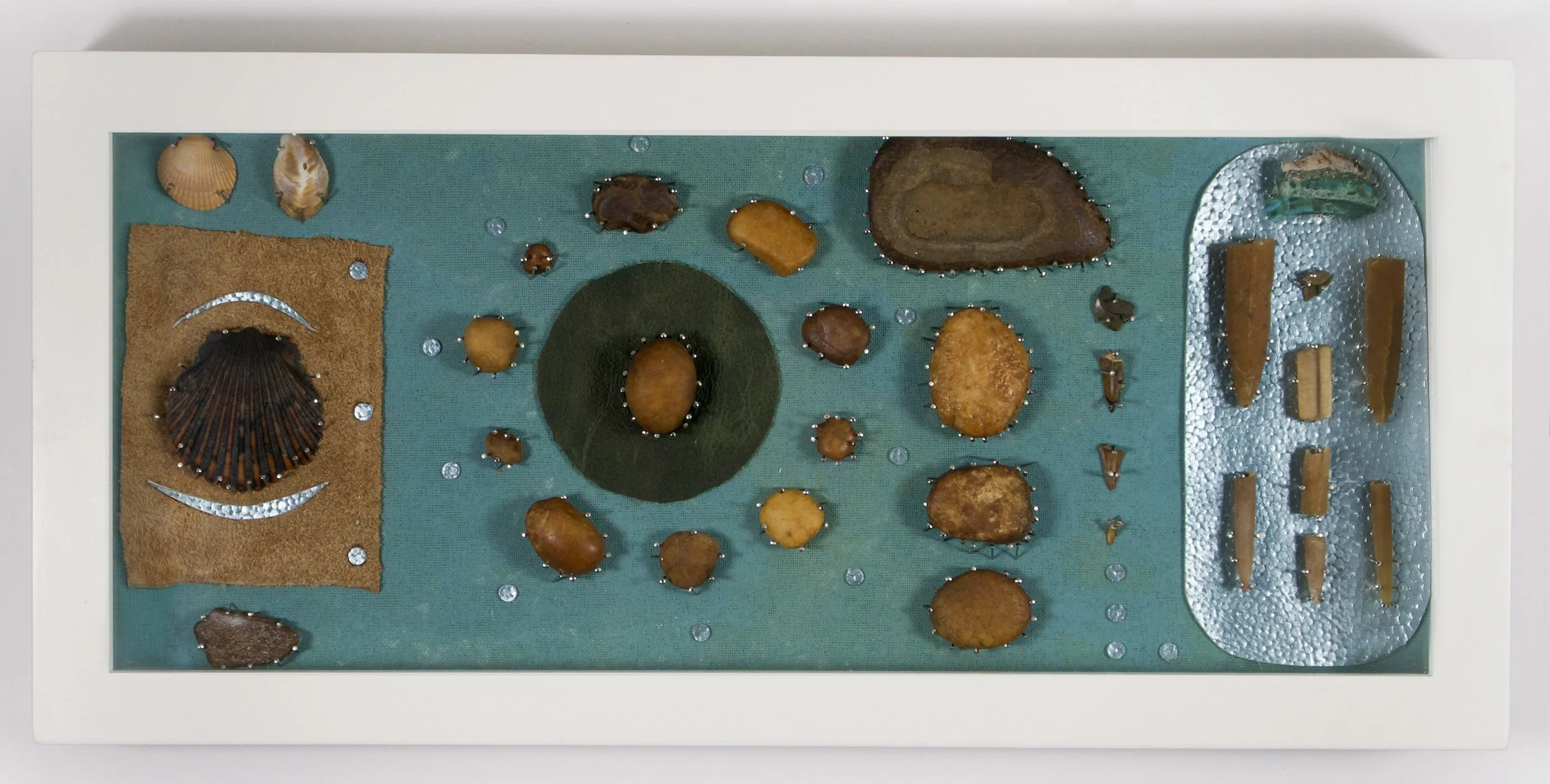 Marine 2025 Collage and assemblage of found objects 7 x 15 1/2 inches.
