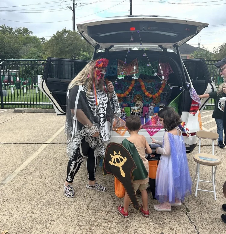 Family celebrating at Trunk-or-Treat