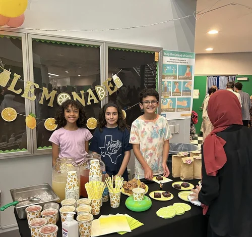 Students running a lemonade stand