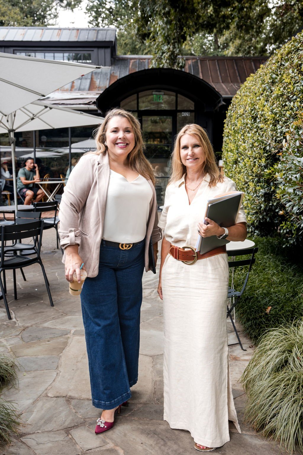 Stafford and Rebecca, trusted Atlanta Realtors and real estate advisors, outside The Chastain