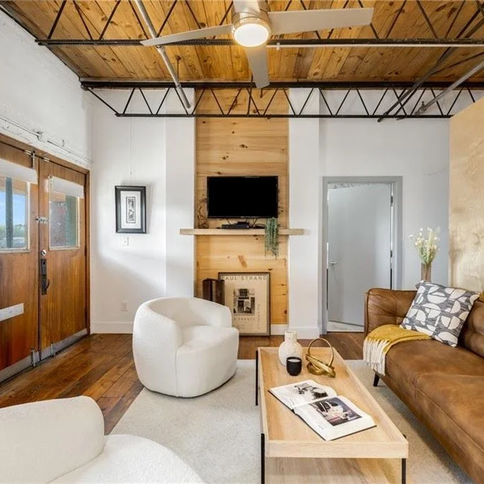 Ever wondered what a historic Atlanta factory-turned-home looks like inside?&rdquo; 

This two-story, 2 bed / 2 bath industrial-chic home in a gated intown community, where a dramatic steel storefront window, polished concrete floors, warm pine upsta