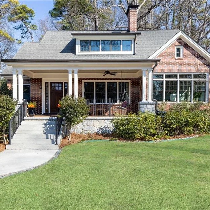 Garden Hills rarely offers this kind of setting &mdash; over half an acre, a level lawn beneath a mature white oak, and a private creek retreat tucked quietly behind the home. Designed and refined by its architect owner, this midcentury cottage has b