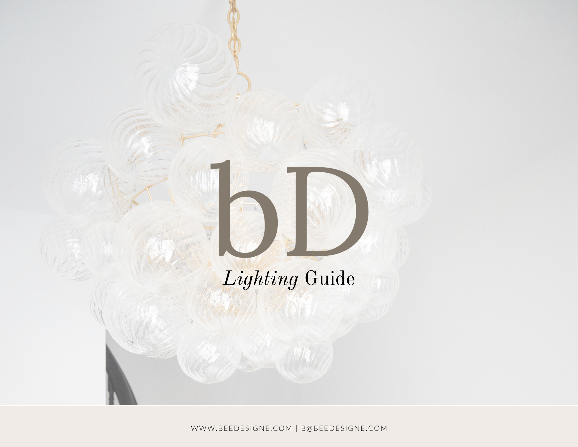 A modern chandelier composed of clear glass globes hanging from a gold-colored chain, with the words 'bD Lighting Guide' and website information overlayed on the image.