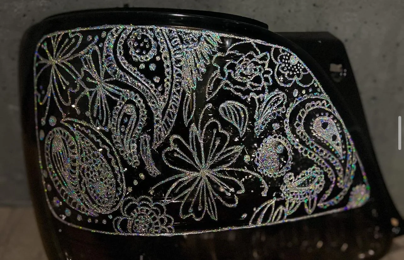 Engraved Lexus tail light with glitter inlay