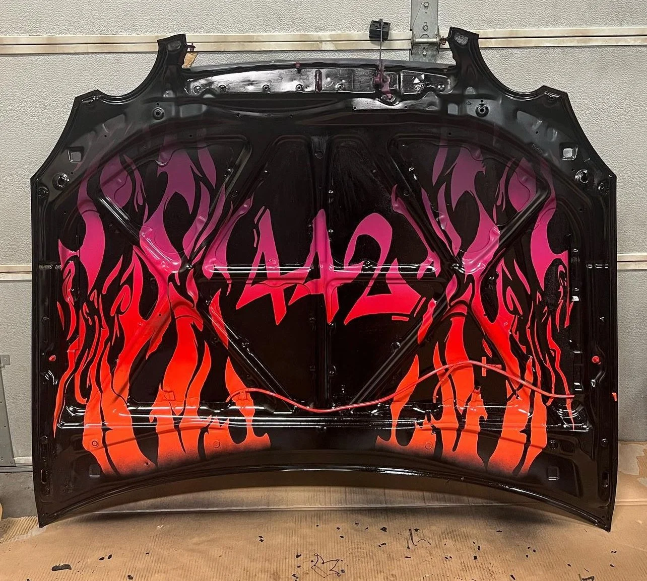 Hand-painted underside of a Lexus GS300 hood
