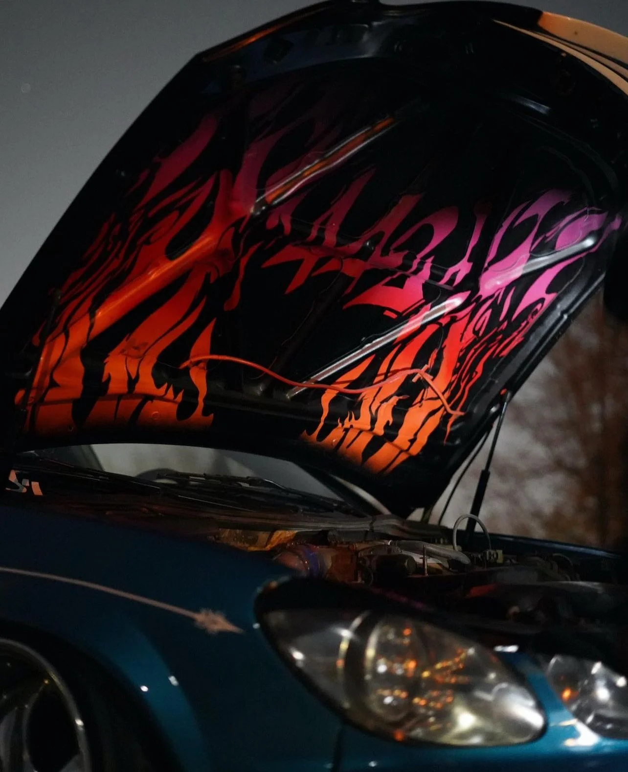 Hand-painted underside of a Lexus GS300 hood