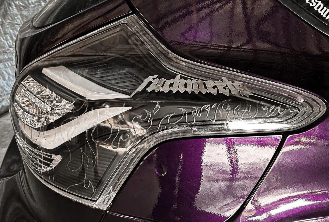 Engraved flame design on aftermarket Ford tail lights