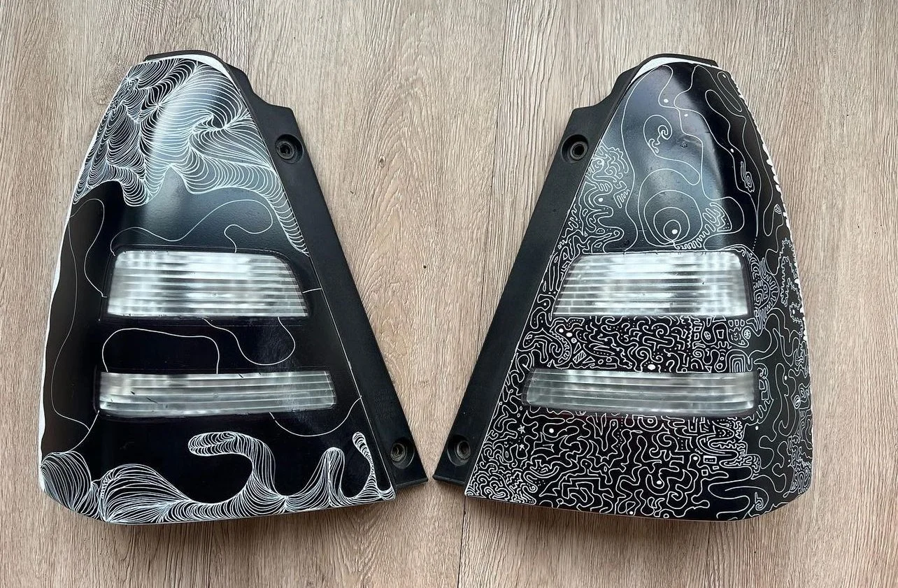 Tinted and hand-painted Subaru tail lights