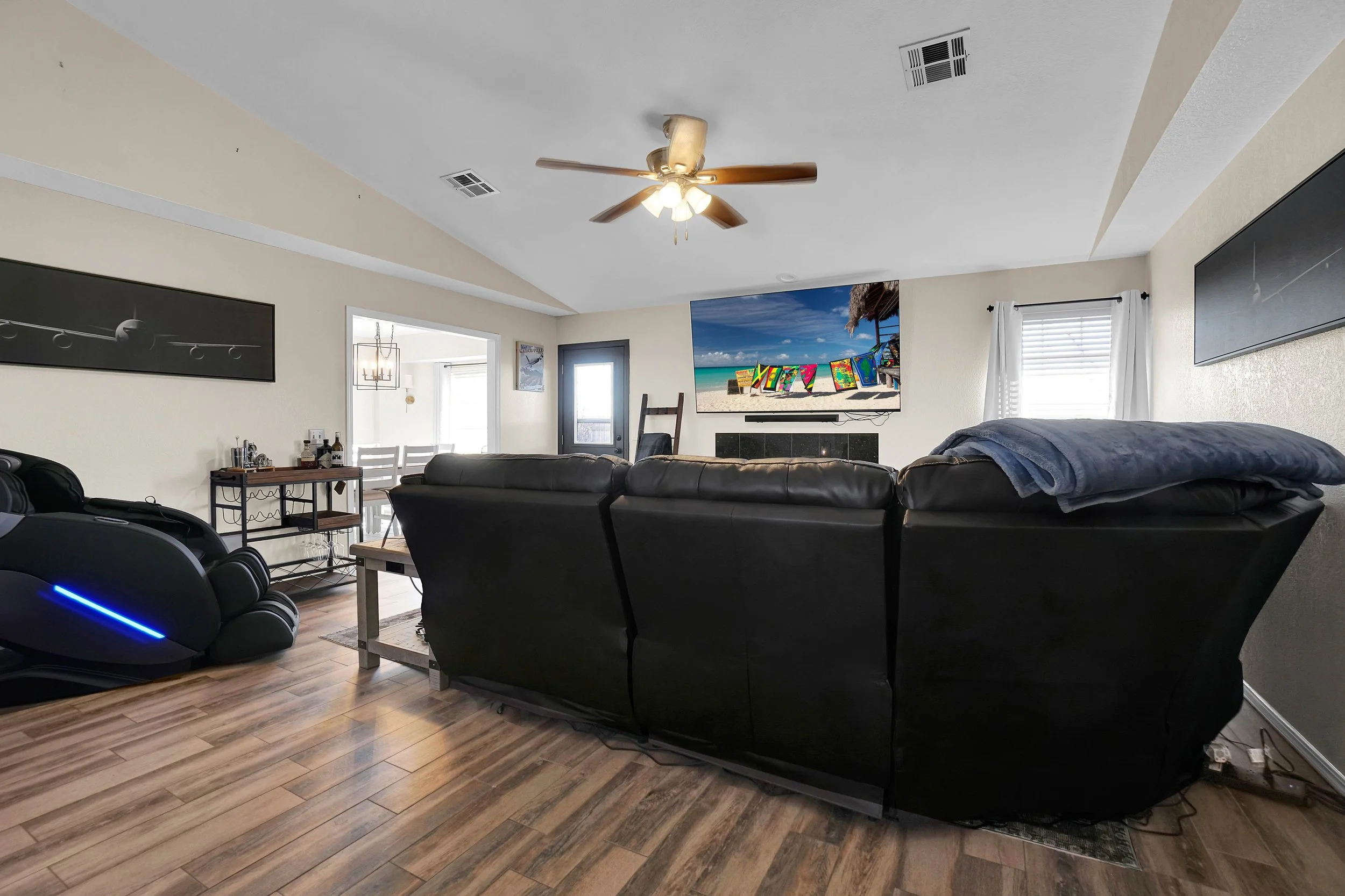 The spacious living room filled with squadron posters- look for yours!