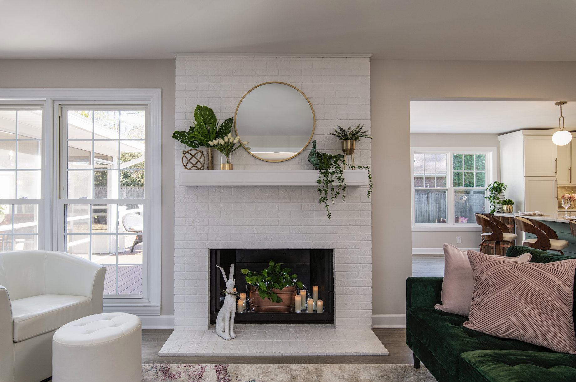 Cozy living room design with white fireplace in NC